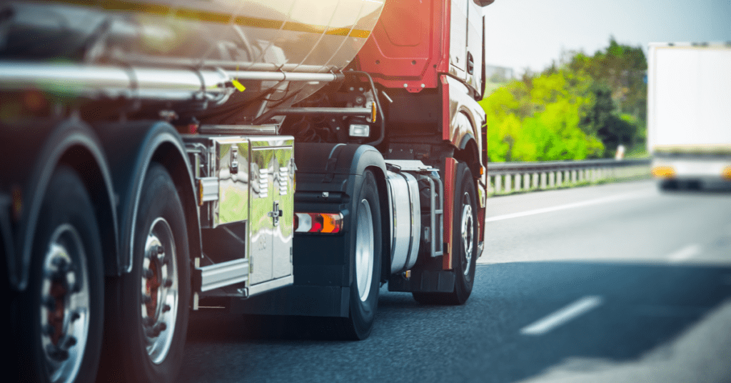 Close-up of a semi truck driving on a highway