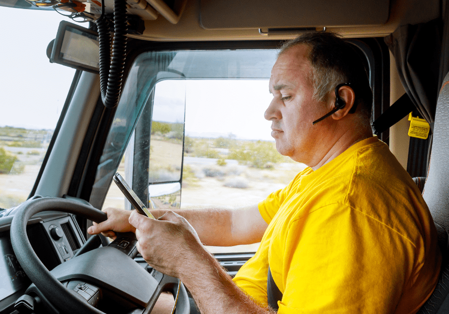 Truck driver using cell phone while driving
